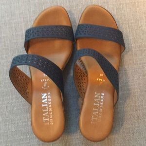 Italian shoemakers slide on heels